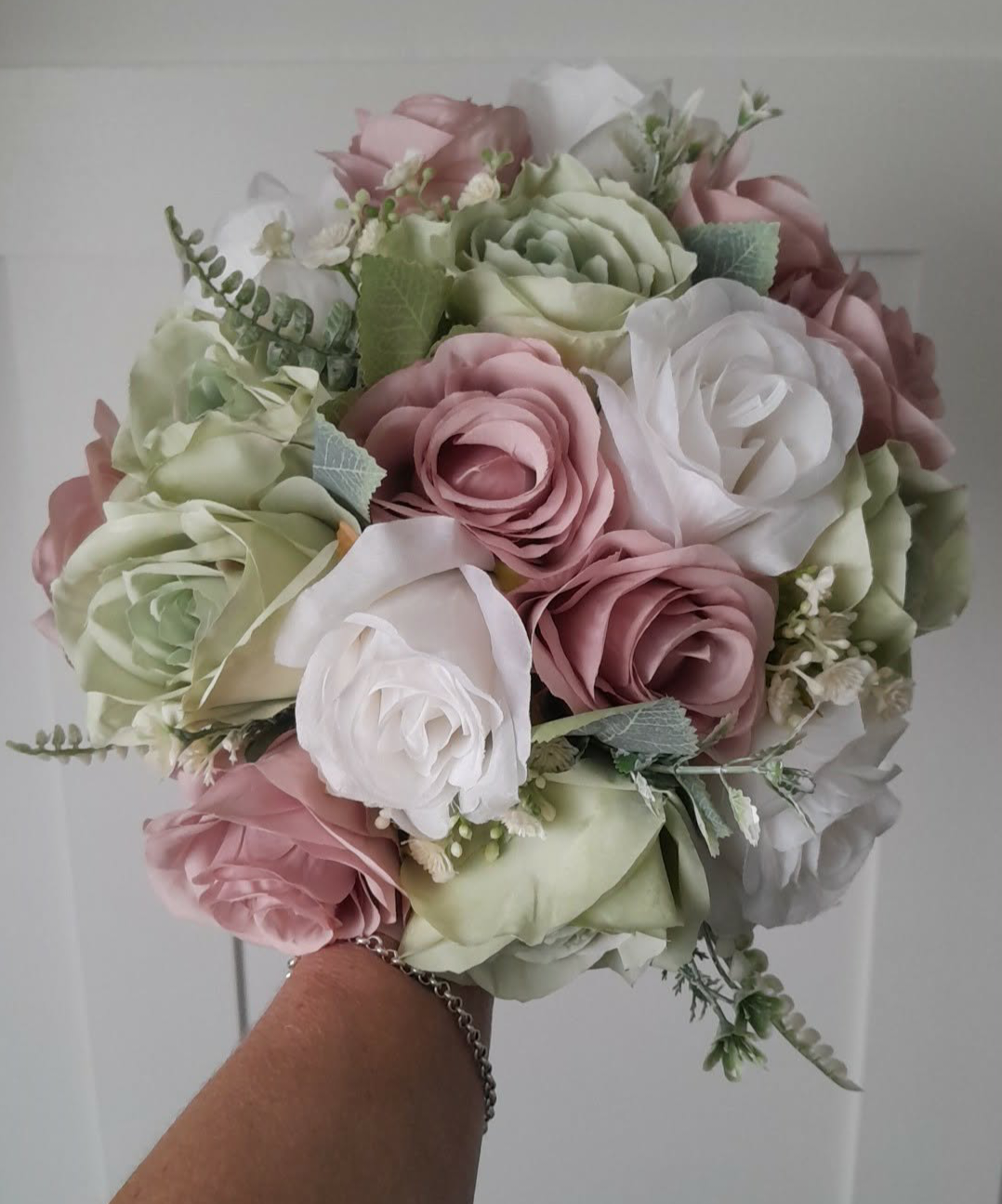 Freya dusky pink rose corsages with white hydrangea and foliage detail
