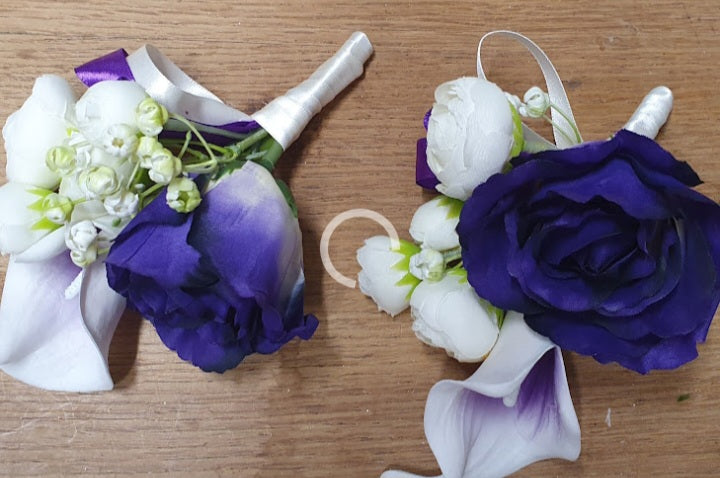Freya collection – three purple and white artificial bridesmaid bouquets on a wooden table