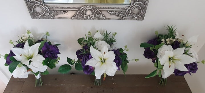 Freya buttonholes and corsages – purple rose and white calla lily with satin ribbon