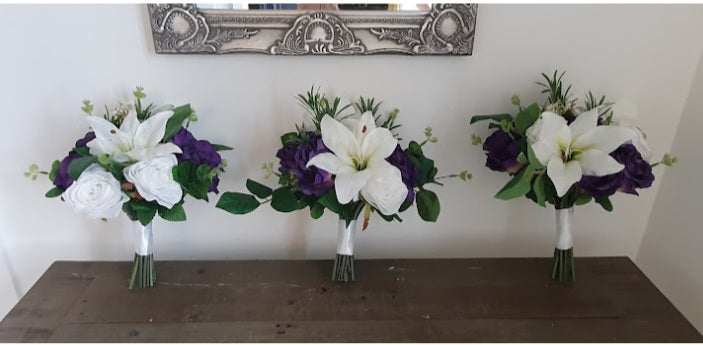 Freya full wedding flower collection – bridal and bridesmaid bouquets displayed on wooden table