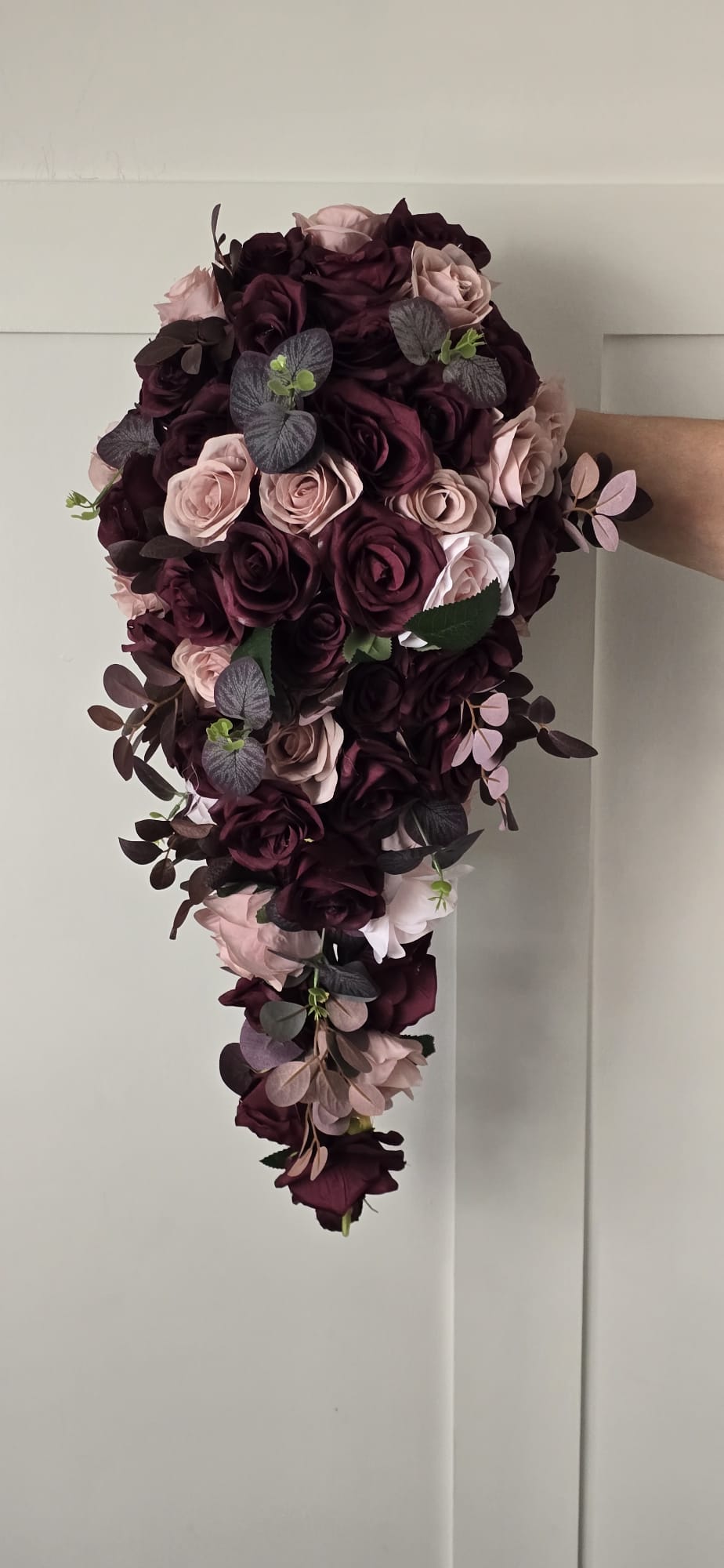 Aoife XXL cascading bridal bouquet showing full teardrop silhouette with deep plum roses, blush roses and dusty blue hydrangea leaves
