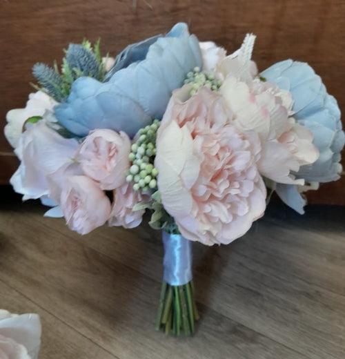 Calliope white rose and blue thistle buttonhole with dusty miller foliage