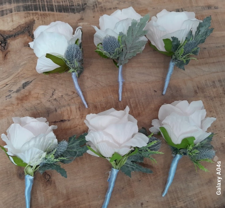 Calliope buttonholes - white rose and blue thistle