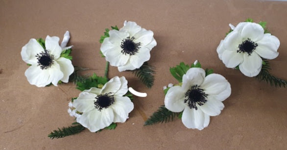 Meliora anemone buttonholes - white anemones with fern and wax flower