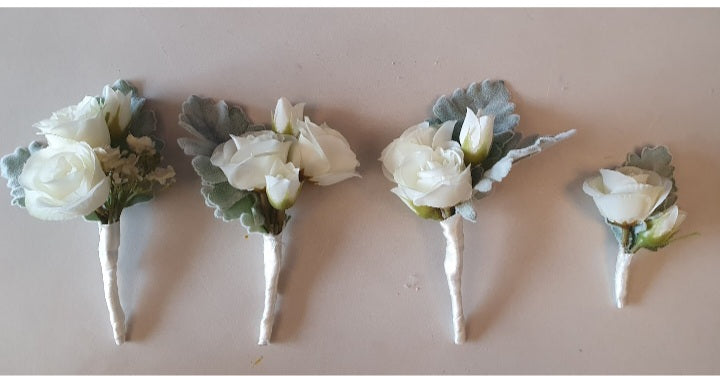 Coralie buttonholes - ivory roses with sage lamb's ear foliage and white ribbon wrap