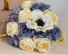 Saoirse bridal bouquet close up - steel blue ranunculus, ivory roses and black-centred anemones