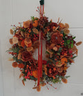 Autumn Harvest Wreath with roses, hydrangeas, pumpkins, berries and red velvet ribbon