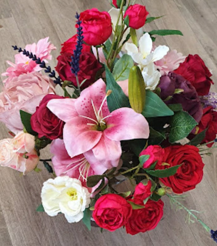 Calantha wedding bouquet - pink stargazer lily, red and hot pink roses, blush peonies, lavender and ivory lisianthus