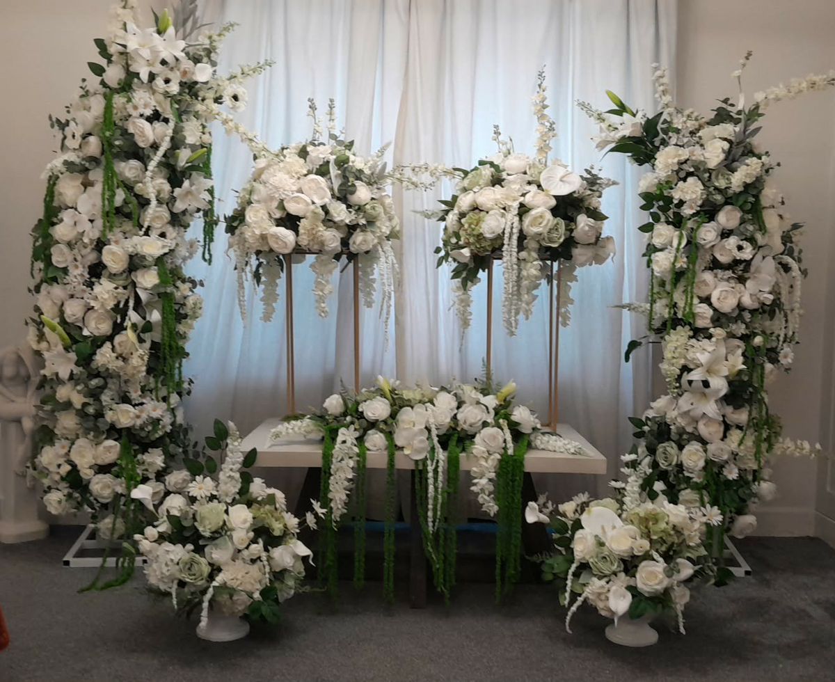 Timeless Elegance pedestal arrangements on gold stands