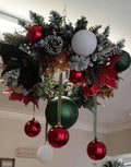 50cm Christmas hanging chandelier ceiling decoration with frosted pine, red poinsettias, large red green and white baubles on ribbons and frosted pine cones