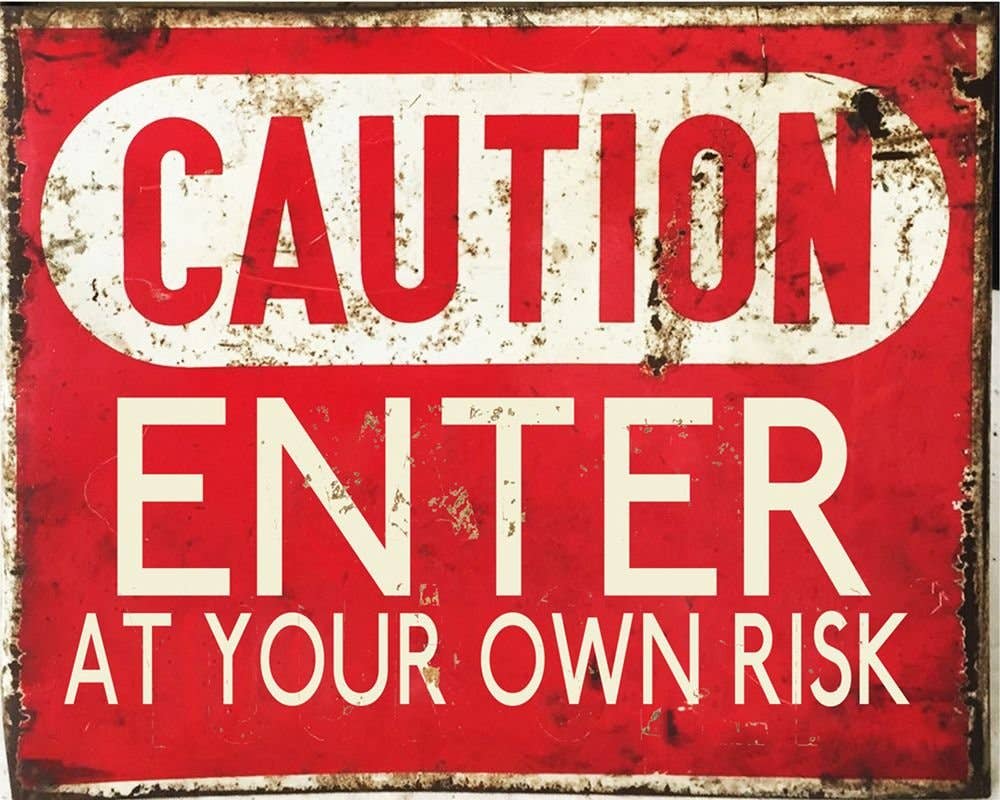 Vintage Metal Sign - Caution Enter At Your Own Risk: Red/White