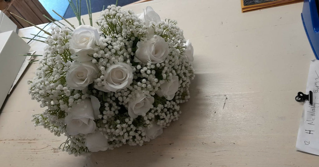 Ottilie bridal bouquet - white roses and gypsophila with natural stem wrap