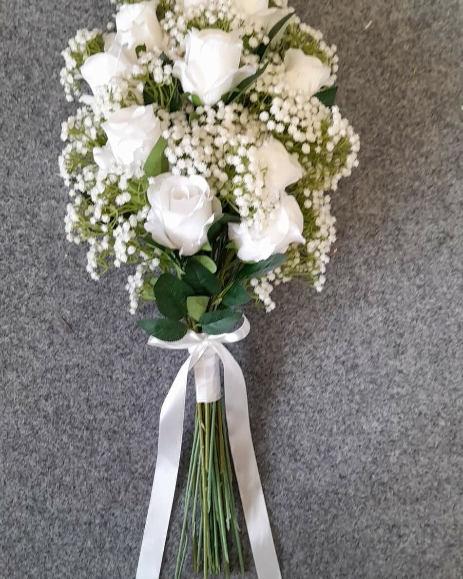 Ottilie bridesmaid bouquet - white roses and gypsophila with long trailing white satin ribbon