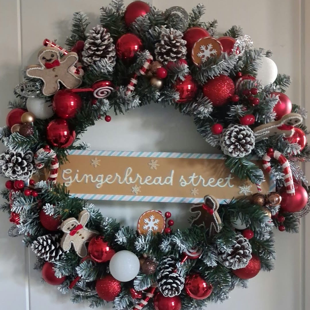 Gingerbread Christmas wreath displayed on a door