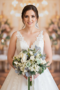 Bride holding bouquet face-on portrait