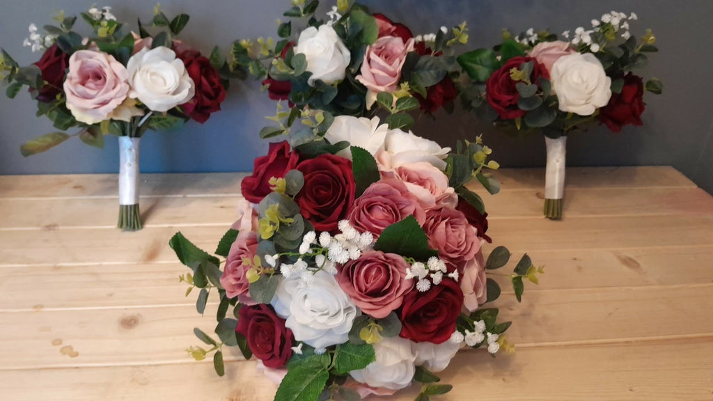 Luna artificial wedding collection showing bridal and bridesmaid bouquets in burgundy and dusky pink