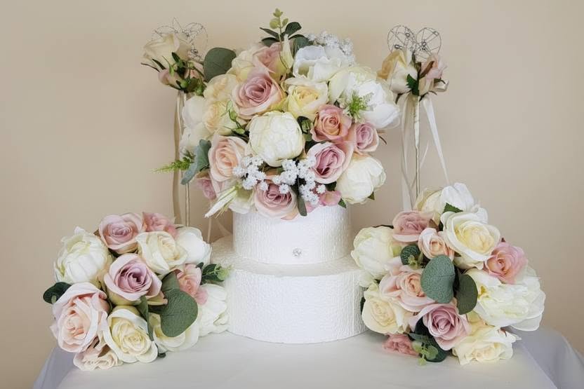 Willow artificial wedding collection in blush pink mauve and ivory roses and peonies styled around a wedding cake