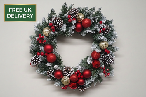 Frosted red and gold wreath with badge