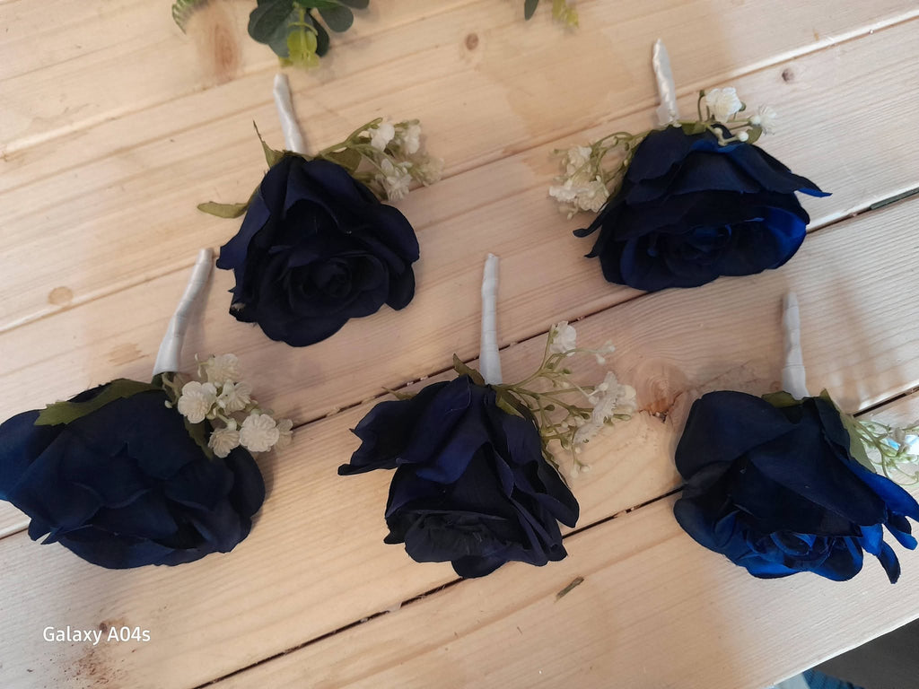 Meave navy rose buttonholes with gypsophila