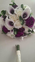 Isolde silk bridal bouquet with deep purple roses and white picasso calla lilies by Boutique Bouquets
