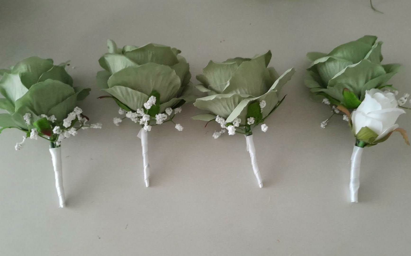 Meave sage green rose buttonholes with gypsophila