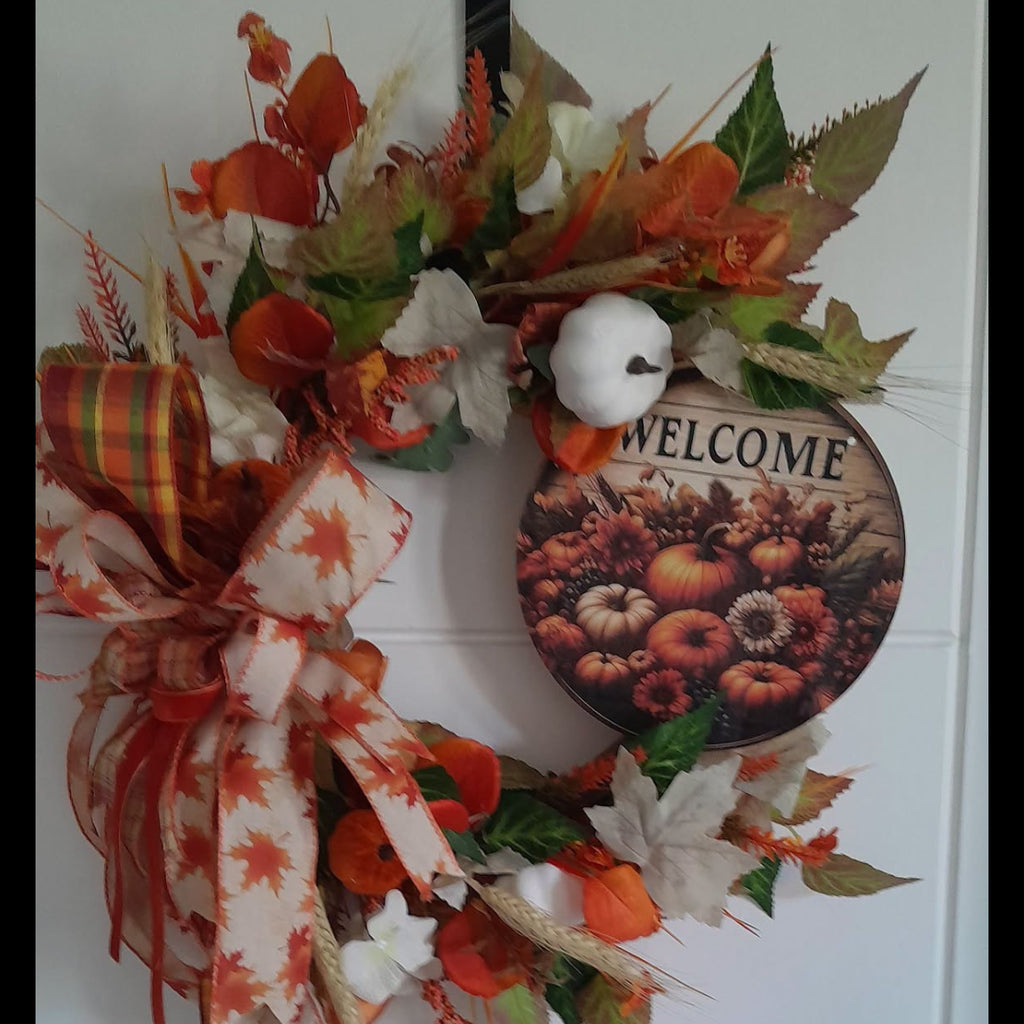 EMBER autumn welcome wreath with orange florals, pumpkin and tartan bow