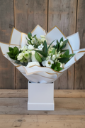 White and green bouquet with white square box